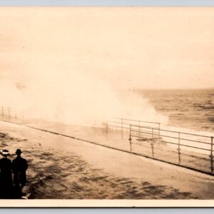 Ocean Wave Hitting Deck Couple In Vintage Clothing Walking Postcard RPPC