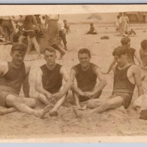 Beach Scene Men Sitting On The Beach Wearing Old Bathing Suits Postcard RPPC