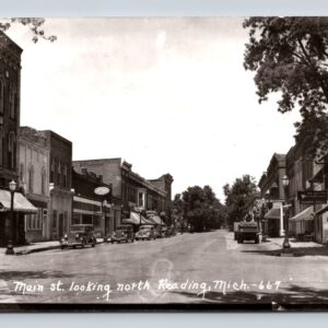Main St Looking North Reading Michigan Postcard RPPC Coca Cola Sign