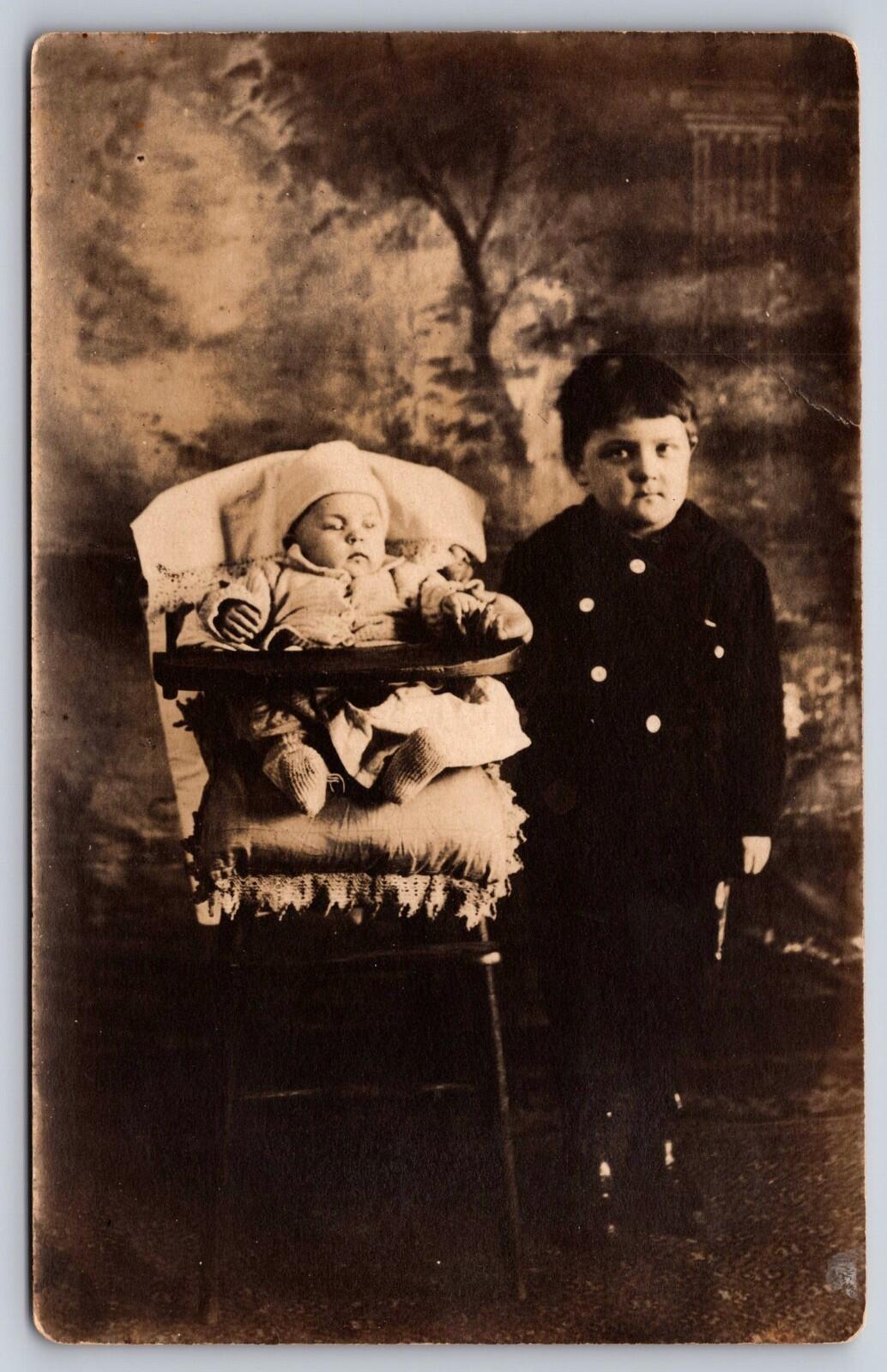 Little Boy And A Baby Family Photo Postcard RPPC