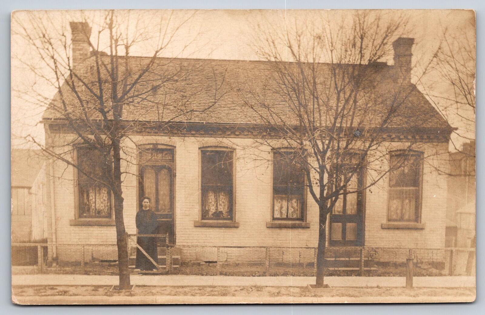 Woman In Front Of House Postcard RPPC Vintage